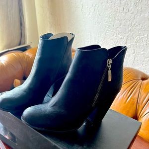Black Michael Shannon boots, 3” heel.